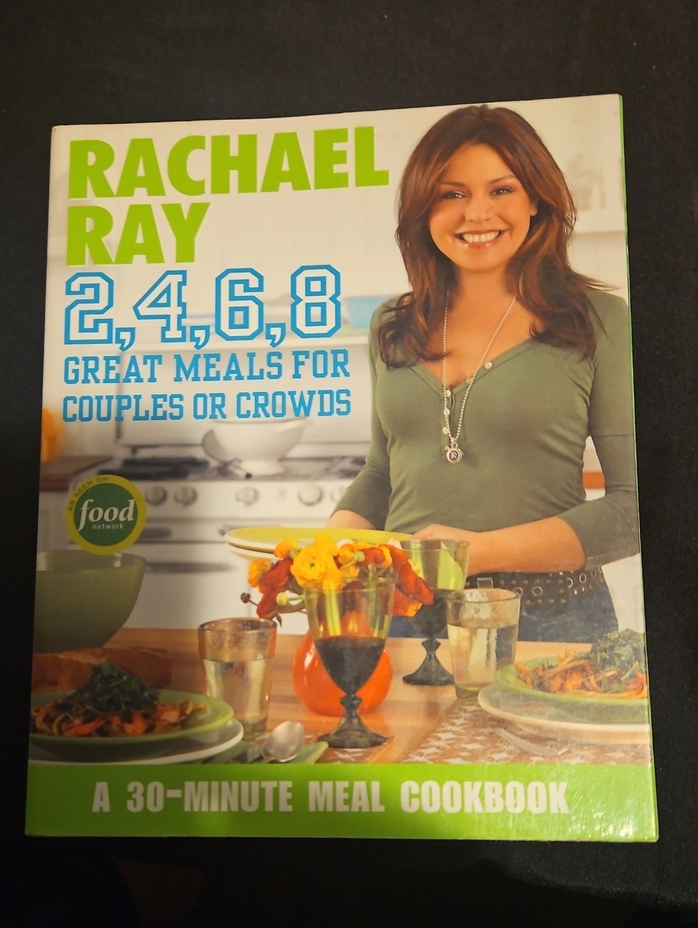Rachael Ray Cookbook with Green Cover and Blue Title Accents